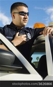 Police Officer Using Two-Way Radio