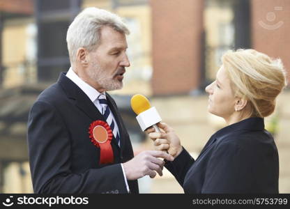 Politician Being Interviewed By Journalist During Election