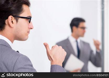 Politician planning speach in front of mirror