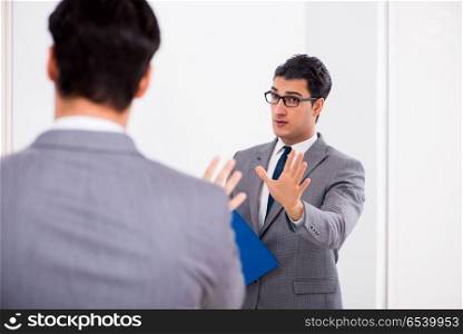 Politician planning speach in front of mirror