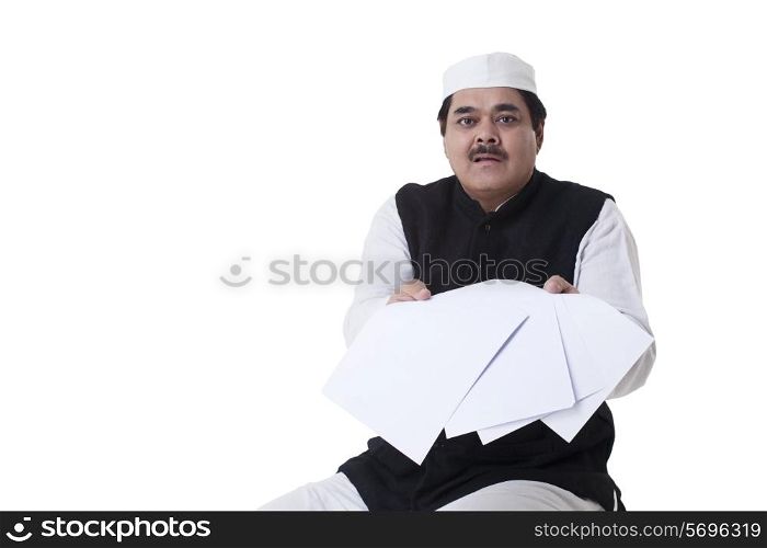 Politician showing blank papers
