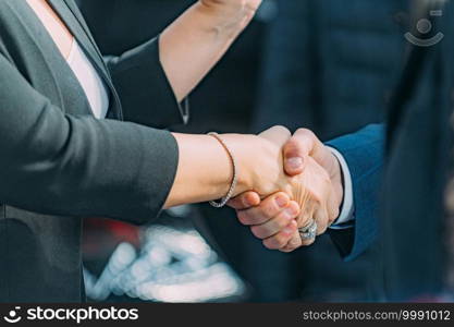 Politicians shaking hands. Female Politician shaking hands with male politician