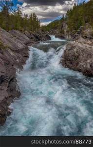 pollfossen waterfall and rocks in norway near geiranger otta river