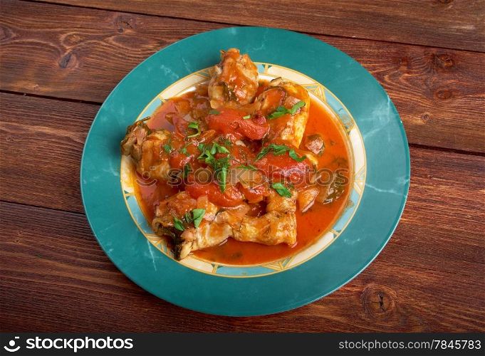 "Pollo alla Cacciatora - means "hunter" in Italian. In cuisine, alla cacciatora refers to a meal prepared "hunter-style" with tomatoes, onions, herbs, often bell pepper, and sometimes wine."
