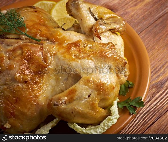 Pollo alla diavola.chicken and lemon sauce.mediterranean cooking