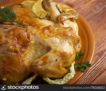 Pollo alla diavola.chicken and lemon sauce.mediterranean cooking