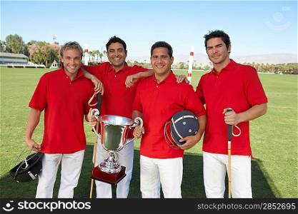 Polo Players with Trophy