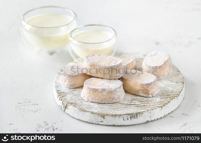Polvoron - Spanish shortbread with glass bowls of milk