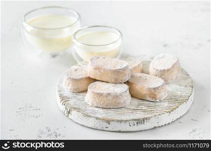 Polvoron - Spanish shortbread with glass bowls of milk