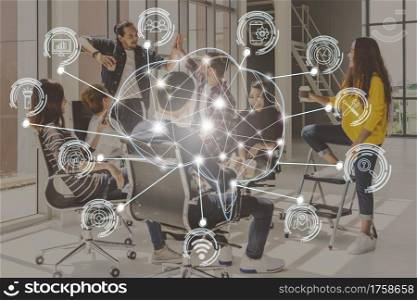 Polygonal brain shape of an artificial intelligence with various icon of smart city Internet of Things over group of diverse Business people are brainstorming and hand shaking