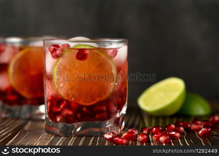 Pomegranate Gimlet - a gin based cocktail with lime juice, gin can be replaced with vodka.