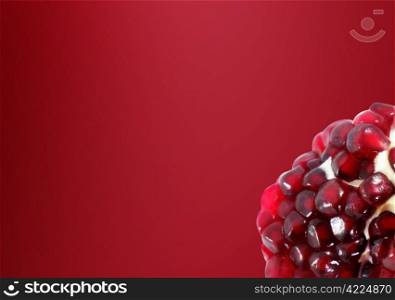 pomegranate on red background.
