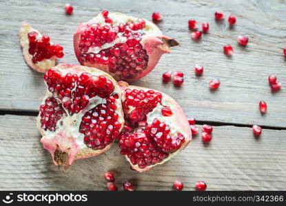 Pomegranate on the wooden background