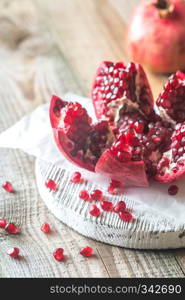 Pomegranate on the wooden board