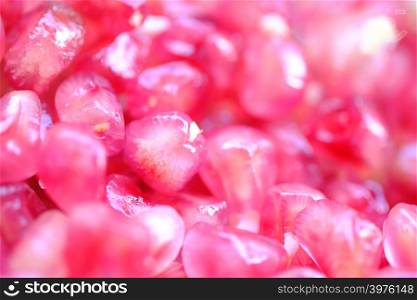 Pomegranate seeds are pink together