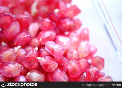 Pomegranate seeds are pink together