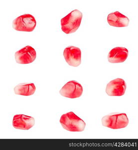 Pomegranate seeds isolated on a white background.