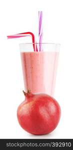 Pomegranate smoothie or yogurt in a glass with a straw and a whole pomegranate isolated on white background. Pomegranate smoothie or yogurt in glass with straw and pomegrana