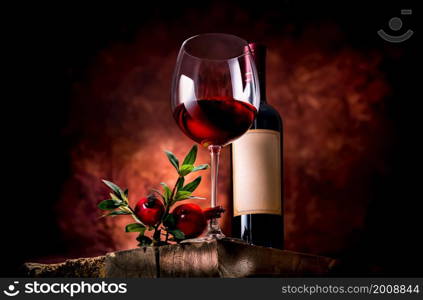 Pomegranate wine on a wooden table in a glass bowl. Pomegranate wine on a table