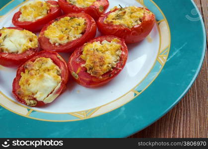 pomodori al forno - Italian stuffed baked tomatoes with mozzarella cheese, garlic and herbs