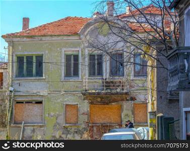 Pomorie, Bulgaria - March 02, 2019: Abandoned Old House In The City Center.