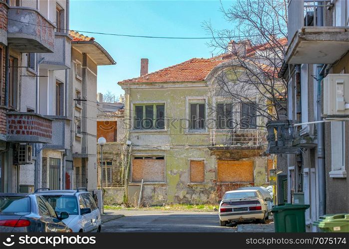 Pomorie, Bulgaria - March 02, 2019: Abandoned Old House In The City Center.