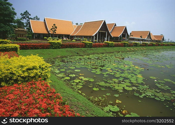 Pond in a formal garden, Sukhothai International Airport, Sukhotai, Thailand