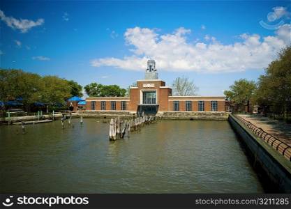 Pond in front of a building, New York City, New York State, USA