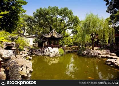 Pond in front of a gazebo, Yu Yuan Gardens, Shanghai, China