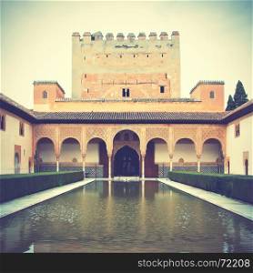 Pond in the Alhambra - masterpiece of moorish architecture (14th century). Retro style filtred