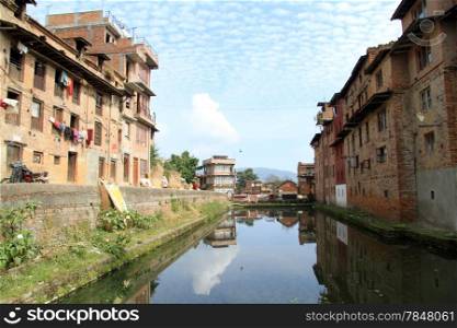 Pond with water and buildings in Bhaktapur, Nepal