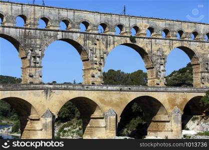 Pont du Gard. France. 06.16.12. Ancient Roman aqueduct built in the first century AD. It crosses the Gardon River near the town of Vers-Pont-du-Gard in southern France. UNESCO World Heritage Site.