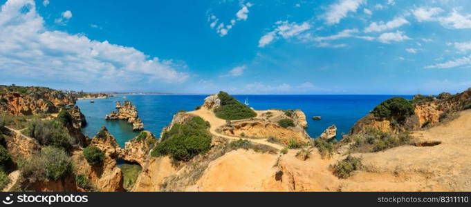 Ponta da Piedade  group of rock formations along coastline of Lagos town, Algarve, Portugal . Three shots stitch high-resolution panorama.