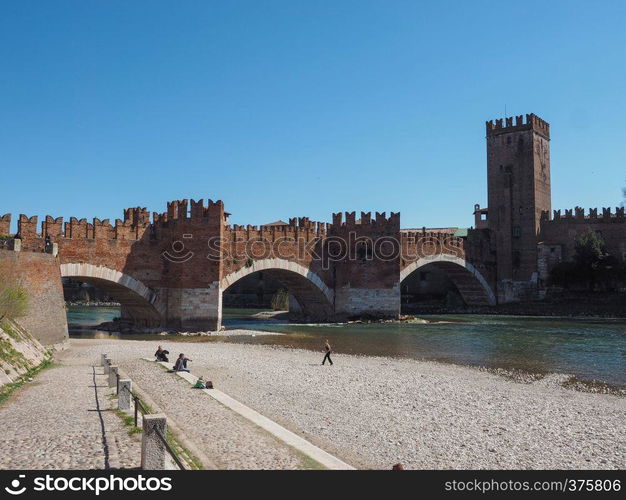 Ponte di Castelvecchio (meaning Old Castle Bridge) aka Ponte Scaligero (meaning Scaliger Bridge) over river Adige in Verona, Italy. Castelvecchio Bridge aka Scaliger Bridge in Verona