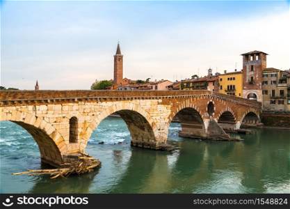 Ponte di Pietra. Bridge in Verona in a summer day, Italy,