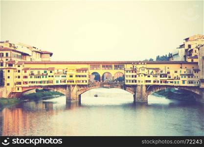 Ponte Vecchio bridge in Florence, Italy. Retro style filtred image