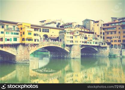 Ponte Vecchio bridge in Florence, Italy. Sepia toned.
