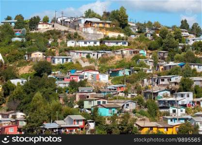Poor houses on the hills of a small town named Tome, Bio Bio Region, Chile