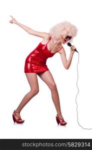 Pop star with mic in red dress on white