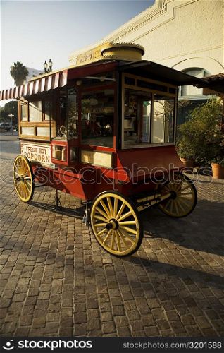 Popcorn cart parked on a street side