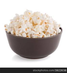 Popcorn in a brown bowl on a white background