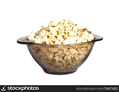 Popcorn in a glass bowl isolated on white