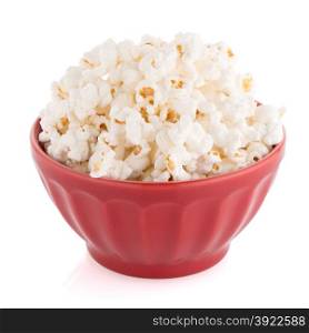 Popcorn in a red bowl on a white background