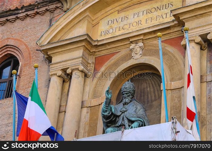 Pope Gregory XIII statue on facade of the Palazzo Comunale in Bologna. Italy