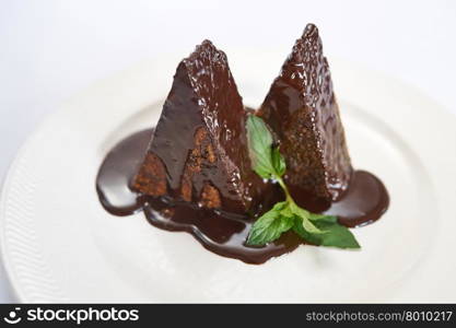 Poppy seed cake on white plate studio shot. Poppy seed cake