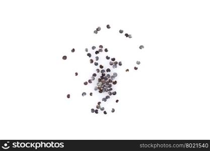 Poppy seeds heap close up isolated on white background