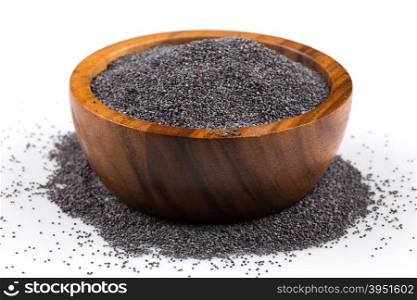 poppy seeds in a wooden bowl on a white background