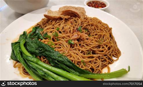 Popular Aisa dish of wanton dry noodles also known as wanton mee