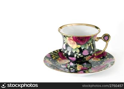 Porcelain cup decorated by roses (handiwork)