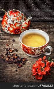 porcelain cup of fragrant tea for medicinal herbs . porcelain cup of fragrant tea for medicinal herbs in retro style.photo tinted